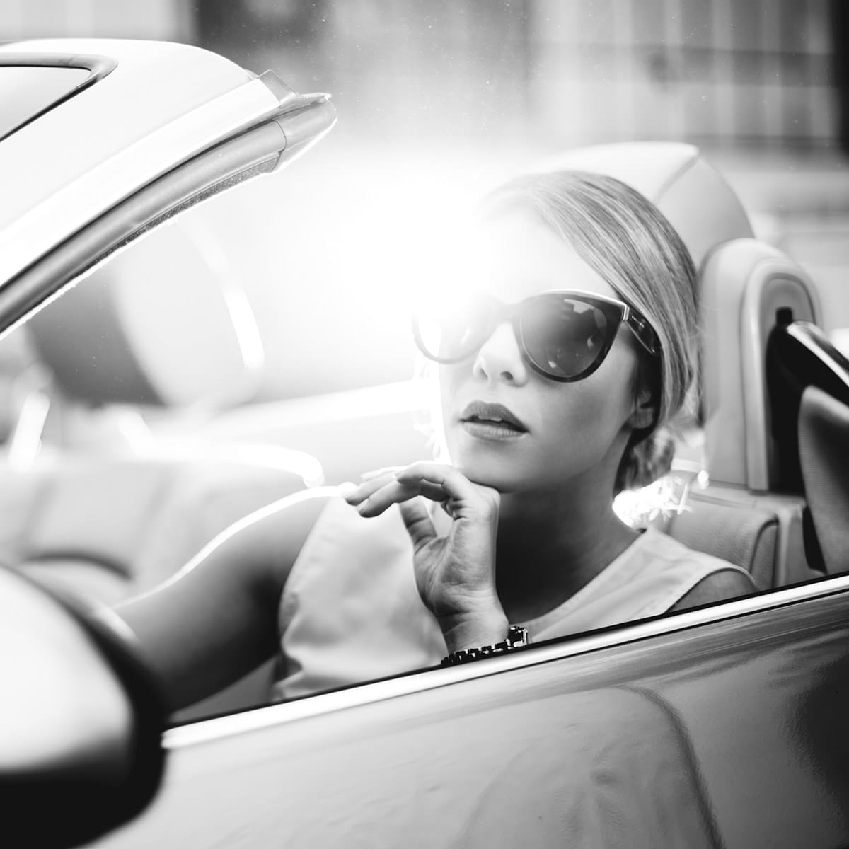 botox patient model driving in a convertible